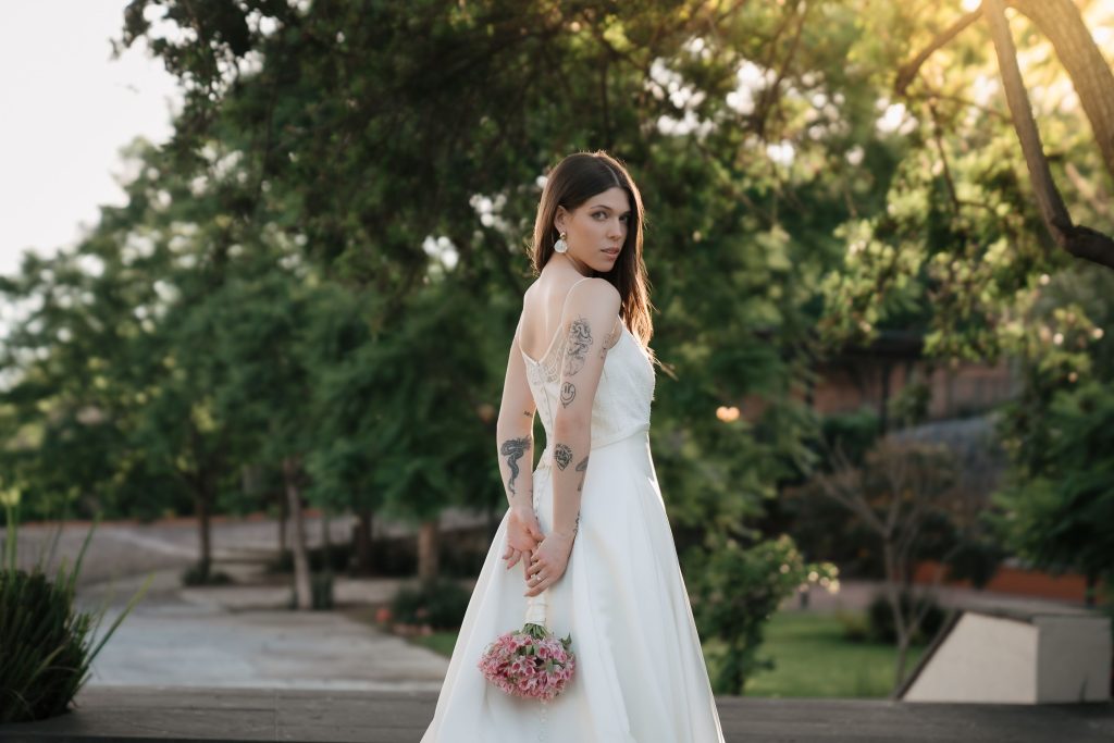 destination wedding brides Transformable wedding dresses allow brides to enjoy multiple looks throughout the day without purchasing entirely separate gowns.