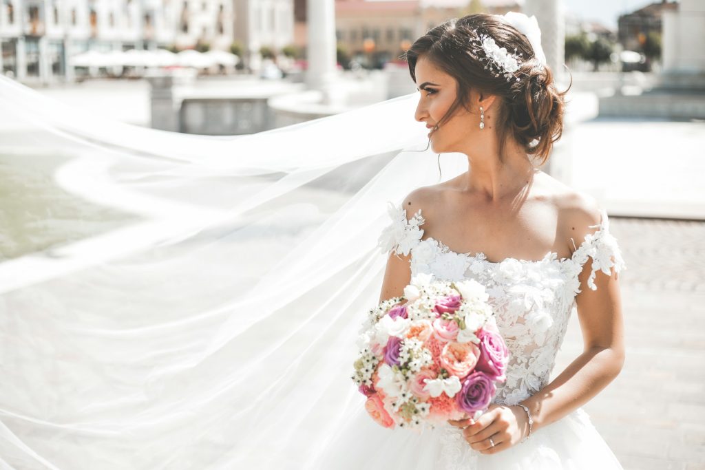 lace wedding dress Lace remains one of the most photogenic fabrics, adding depth and movement to wedding photography without overwhelming the bride
